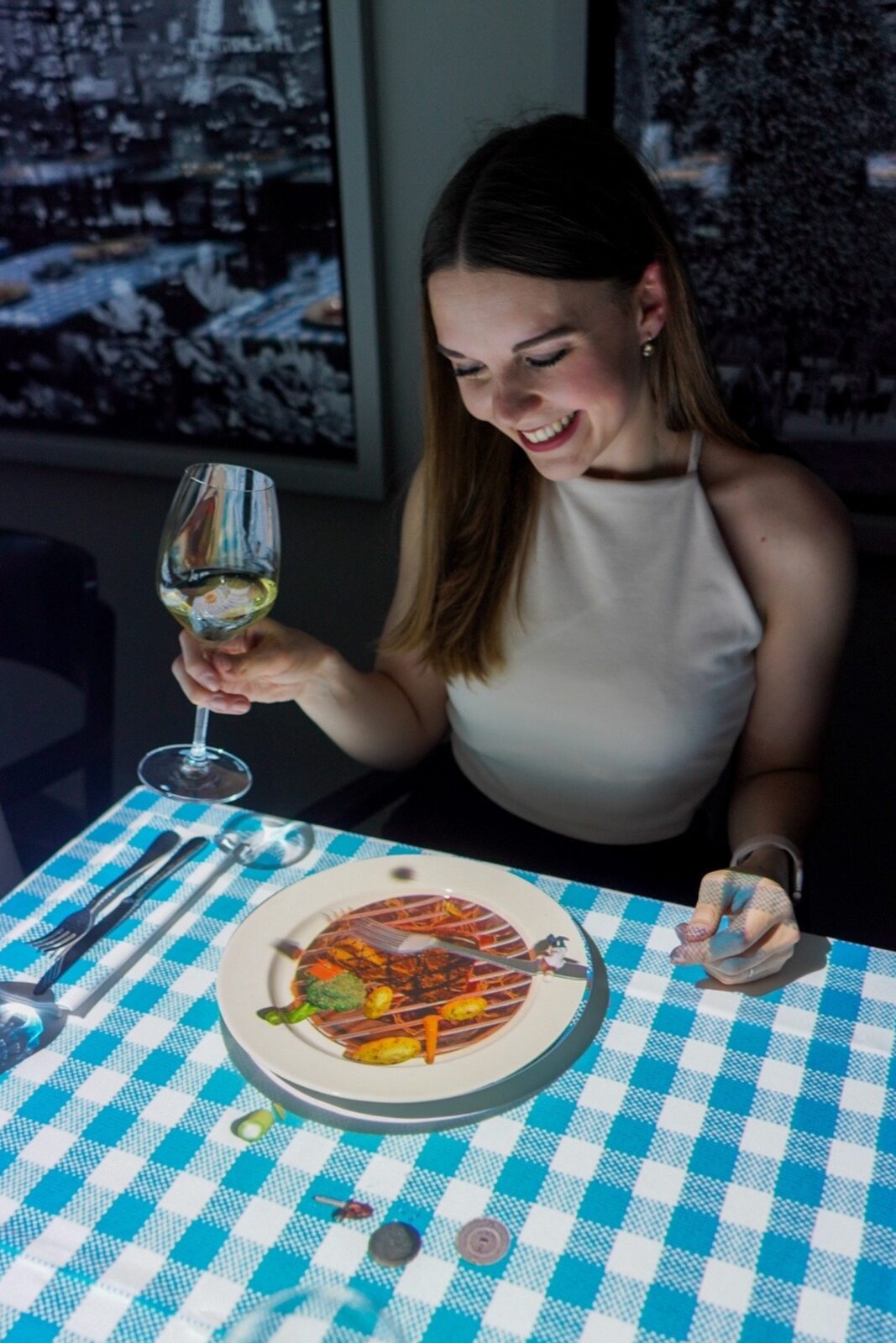 Guest enjoying the Le Petit Chef dinner experience